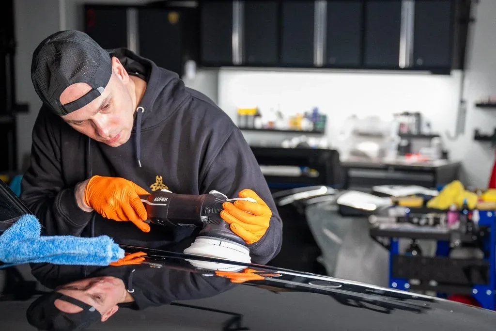 Kamil performing paint correction